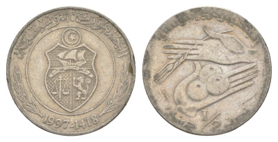 Тунис 1/2 динара 1997 KM 346 медно-никель 4513-313